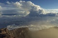 Kerinci volcano summit caldera in early morning high above the clouds in Sumatra, Indonesia Royalty Free Stock Photo