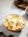 Keripik singkong. Cassava chips or tapioca chips is traditional snack from Java, made of cassava thinly sliced and fried Royalty Free Stock Photo