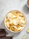 Keripik singkong. Cassava chips or tapioca chips is traditional snack from Java, made of cassava thinly sliced and fried Royalty Free Stock Photo