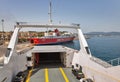 Open hold of Ano Hora II ferry ship in port of Corfu, Greece Royalty Free Stock Photo