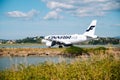 Kerkyra, Greece - 09 24 2022: Corfu Airport, Finnair Plane Takes Off From Runway. Unexpected obstacles and missed