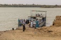 KERMA, SUDAN - FEBRUARY 27, 2019: View of a ferry crossing the river Nile in Kerma, Sud