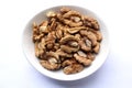 Kernel walnuts in white dish