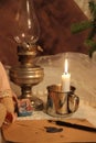 Kerosene lamp and candle. Fountain pen. Old envelope. Fortune-telling at night.