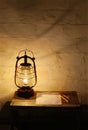 Kerosene lantern on wooden table Royalty Free Stock Photo