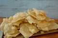 Kerupuk gendar, rice crackers the one of the popular crackers in Indonesia on the top of wooden table