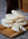 Kerupuk ikan putih or kerupuk warung is Indonesian deep fried crackers made from starch mixed with flavorings such as fish