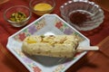 Kesar Pista Kulfi on plate and ingredients studio shot Kalyan Royalty Free Stock Photo