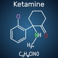 Ketamine molecule. It is used for anesthesia in medicine. Structural chemical formula and molecule model on the dark blue