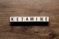 Ketamine - word concept on building blocks, text