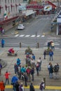 Ketchikan, Alaska: Tour guides holding signs greet cruise ship passengers Royalty Free Stock Photo