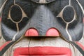 Ketchikan, Alaska, USA - May 22, 2023: Brightly painted face on Totem Pole Royalty Free Stock Photo