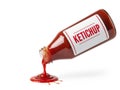 Ketchup bottle spilling ketchup isolated on white background Royalty Free Stock Photo