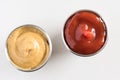 Ketchup and Mustard in Condiment Cups