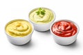 ketchup mustard and mayonnaise in small jars isolated on white background