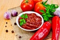 Ketchup with vegetables on a napkin burlap Royalty Free Stock Photo