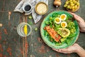 Keto bowl salmon salad with greens, eggs and avocado. Ketogenic diet breakfast lunch. Top view