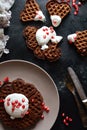 Keto Chocolate Waffles with Whipped Cream and Pomegranate Seeds