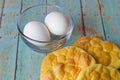 Keto Egg Bread on a wood plank board with a bowl of eggs Royalty Free Stock Photo