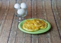 Keto Egg Bread on a wood plank board with a bowl of eggs Royalty Free Stock Photo