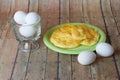 Keto Egg Bread on a wood plank board with a bowl of eggs Royalty Free Stock Photo