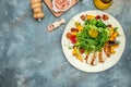 keto meal fresh salad with grilled chicken fillet, feta cheese, caramelized pumpkin, superfood concept. Healthy, clean eating, Royalty Free Stock Photo