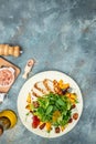 keto meal fresh salad with grilled chicken fillet, feta cheese, caramelized pumpkin, superfood concept. Healthy, clean eating, Royalty Free Stock Photo