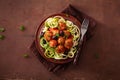 Keto paleo zoodles zucchini noodles with meatballs and olives Royalty Free Stock Photo