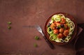 Keto paleo zoodles zucchini noodles with meatballs and olives Royalty Free Stock Photo