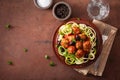 Keto paleo zoodles zucchini noodles with meatballs and olives Royalty Free Stock Photo