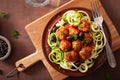 Keto paleo zoodles zucchini noodles with meatballs and olives Royalty Free Stock Photo