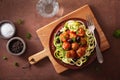 Keto paleo zoodles zucchini noodles with meatballs and olives Royalty Free Stock Photo