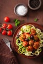 Keto paleo zoodles zucchini noodles with meatballs and olives Royalty Free Stock Photo