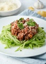 Keto pasta Bolognese with mincemeat and zucchini noodles, fodmap, lchf, low carb. Vertical