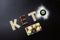 Keto protein balls and matcha tea recipes ingredients on dark wooden background make text keto. it works ketogenic diet. Royalty Free Stock Photo