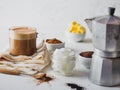 KETOGENIC KETO DIET DRINK. Coffe and cacao blended with coconut oil. Cup of bulletproof coffe with cacao and ingredients Royalty Free Stock Photo