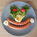 Ketogenic meal, hit dogs with tomatoes, mayonnaise, cheese, lettuce. Keto food for weight loss. Healthy diet dinner