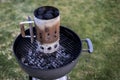 Kettle barbecue charcoal grill roasting BBQ standing on gras ready for action Royalty Free Stock Photo