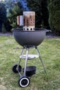 Kettle barbecue charcoal grill roasting BBQ standing on gras ready for action Royalty Free Stock Photo