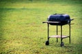 Kettle barbecue grill in the garden or lawn at picnic area