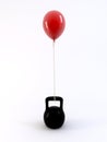 Kettle bell and red ballon