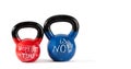 Kettle bells with motivational lettering.