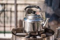 Kettle with boiling water and steam Royalty Free Stock Photo
