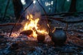 Kettle on a campfire in the forest at night,  Tea ceremony Royalty Free Stock Photo