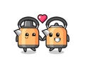 Kettle cartoon character couple with fall in love gesture Royalty Free Stock Photo