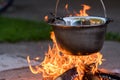 Kettle on the fire , cooking in the nature