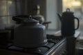 Kettle in kitchen. Water kettle. Darkens indoors