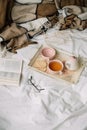 Kettle with tea and cups on a tray. Breakfast at home in bed, coziness Royalty Free Stock Photo