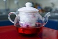 A kettle with tea flowers roses Royalty Free Stock Photo