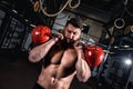 Kettlebell cross workout training in the gym with young muscular sweaty man with muscless. Royalty Free Stock Photo